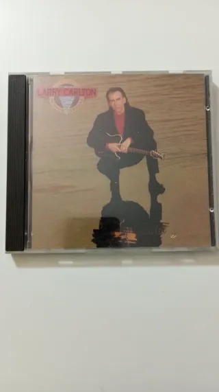 CD Larry Carlton - On Solid Ground