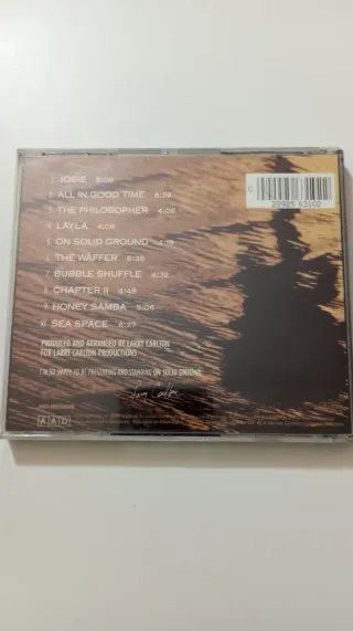 CD Larry Carlton - On Solid Ground