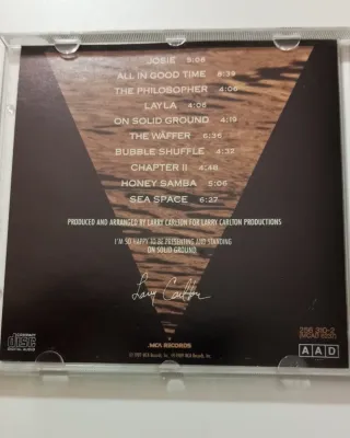 CD Larry Carlton - On Solid Ground
