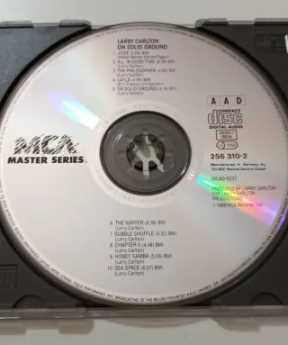 CD Larry Carlton - On Solid Ground