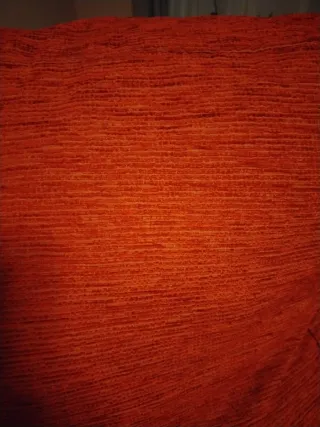 Sofá cama rojo de tela