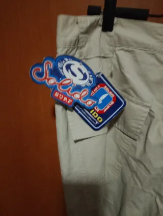 Pantalones acampanados beige