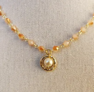 Collana cristalli rosa albicocca e perla