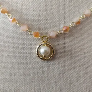 Collana cristalli rosa albicocca e perla