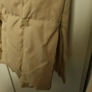 Piumino lungo beige con pelliccia