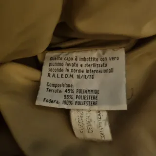 Piumino lungo beige con pelliccia