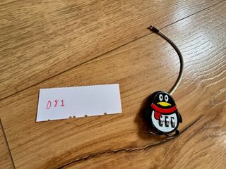 Candado de combinación en forma de pingüino