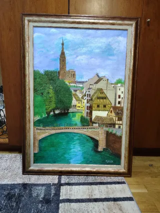 Cuadro al óleo de pueblo con puente