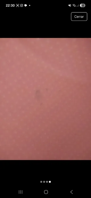 Minicuna rosa con puntos blancos