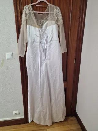 Vestido de boda blanco con pedrería