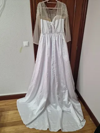 Vestido de boda blanco con pedrería