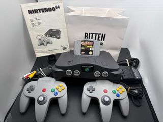 Nintendo 64 + 2 Controller + MANUALE + / CAMBIO