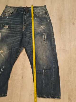 Jeans uomo strappati