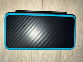 Nintendo 2DS XL + Extra