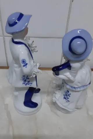 Pareja figuras porcelana música