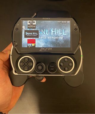 PSP GO Negra + Cargador Origi + Funda + Accesorios