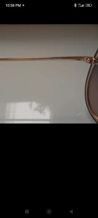 Occhiali da sole aviator dorati e grigi