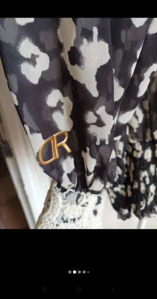 Blusa Denny Rose fantasia leopardata