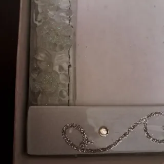 Cornice Murano in  Vetro Argentato con strass.