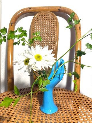 FIGURA FLORERO EXPOSITOR VINTAGE.