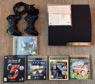 Consola PS3 con todos los accesorios y 5 juegos