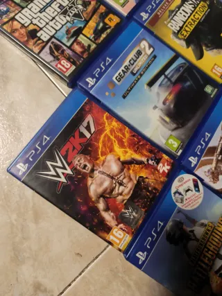 Lote Videojuegos PS4: FIFA 22, GTA V, WWE 2K17