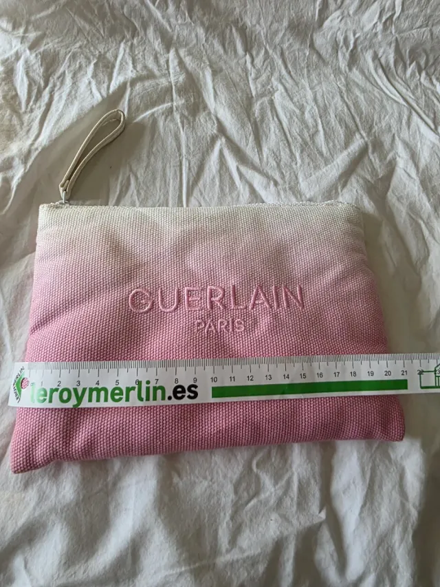 Bolso de mano Guerlain rosa y blanco