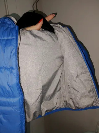 Giubbotto neonato blu imbottito double face.