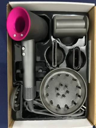 Secador de pelo  rosa y negro