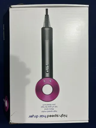 Secador de pelo  rosa y negro