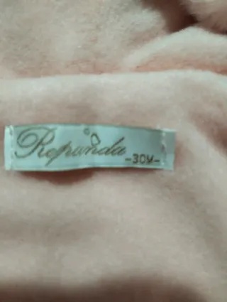 Pellicciotto rosa con cappuccio e cintura