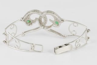 Pulsera en oro blanco 18k, brillantes y esmeraldas