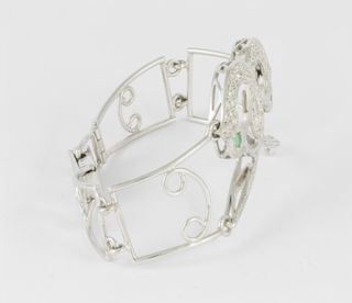 Pulsera en oro blanco 18k, brillantes y esmeraldas