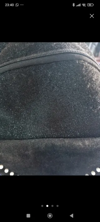 Mochila negra brillante con pedrería