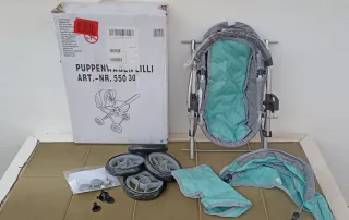 Carrello per bambole Bayer.