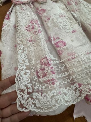 Volcada de bebé rosa con capota