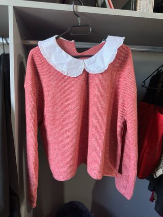 Jersey rosa con cuello blanco