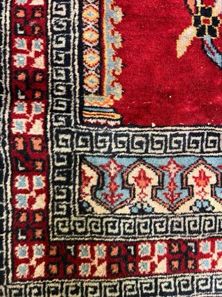 Tappeto in lana rosso e nero