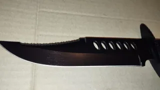 Utensilio de caza/coleccionismo con funda