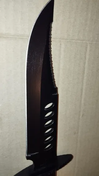 Utensilio de caza/coleccionismo con funda