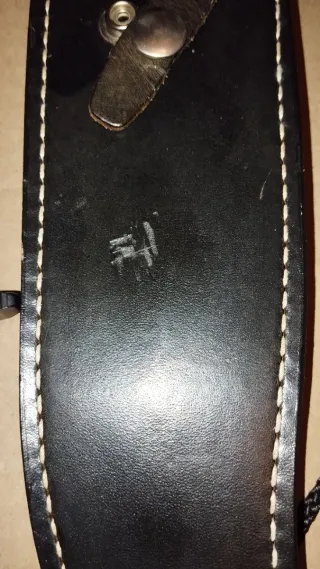 Utensilio de caza/coleccionismo con funda