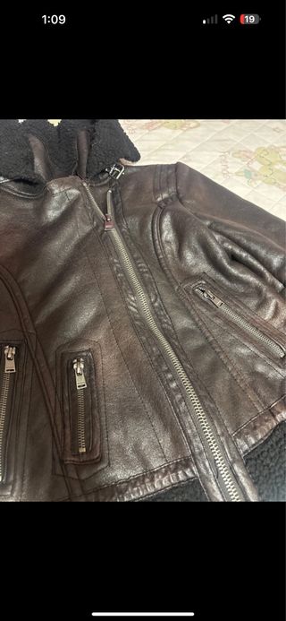 Pelliza marrón y negra