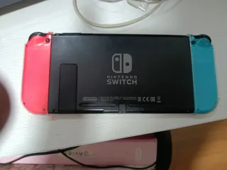 Nintendo Switch Azul y Rojo mas tres juegos y mand