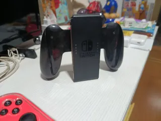 Nintendo Switch Azul y Rojo mas tres juegos y mand