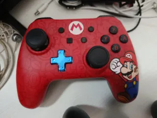Nintendo Switch Azul y Rojo mas tres juegos y mand