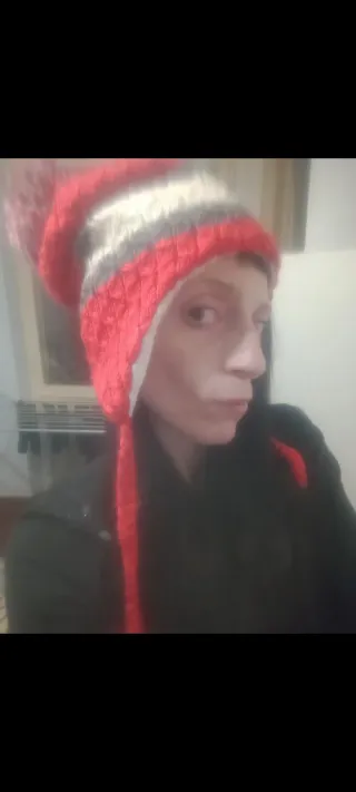 Cappellino invernale con PON PON in cima e due pon