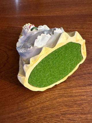 Figura de porcelana niña con flor