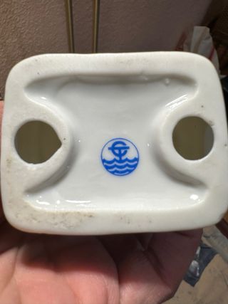 Figura porcelana campesina azul y oro