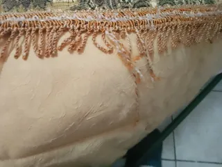 Copriletto beige e oro con frange