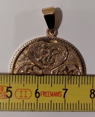 Colgante moneda oro 18k de 1930 y su peso 12,7gr